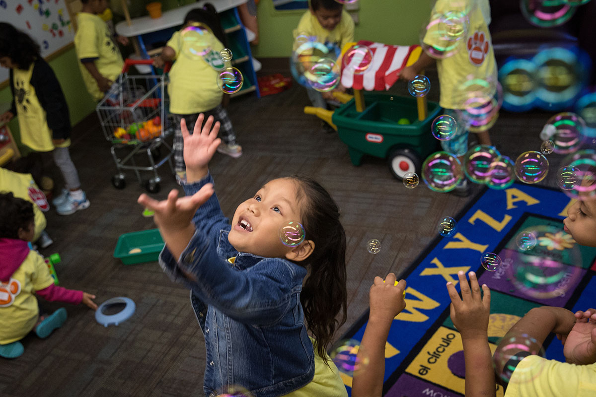 Children playing with bubbles